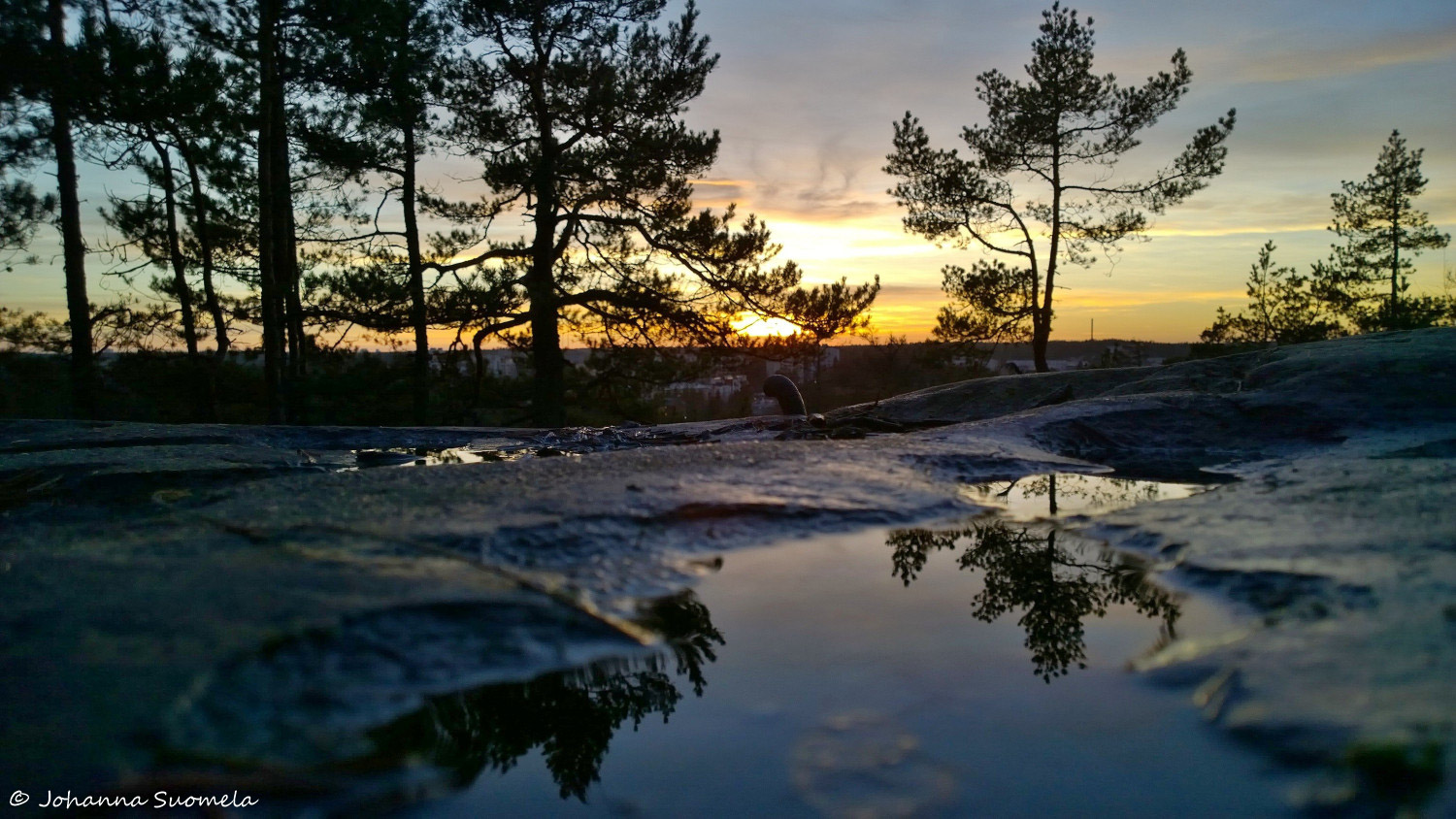 Auringonlasku heijastus