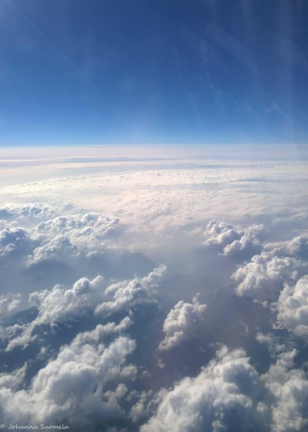 Pilviä lentokoneesta kuvattuna.