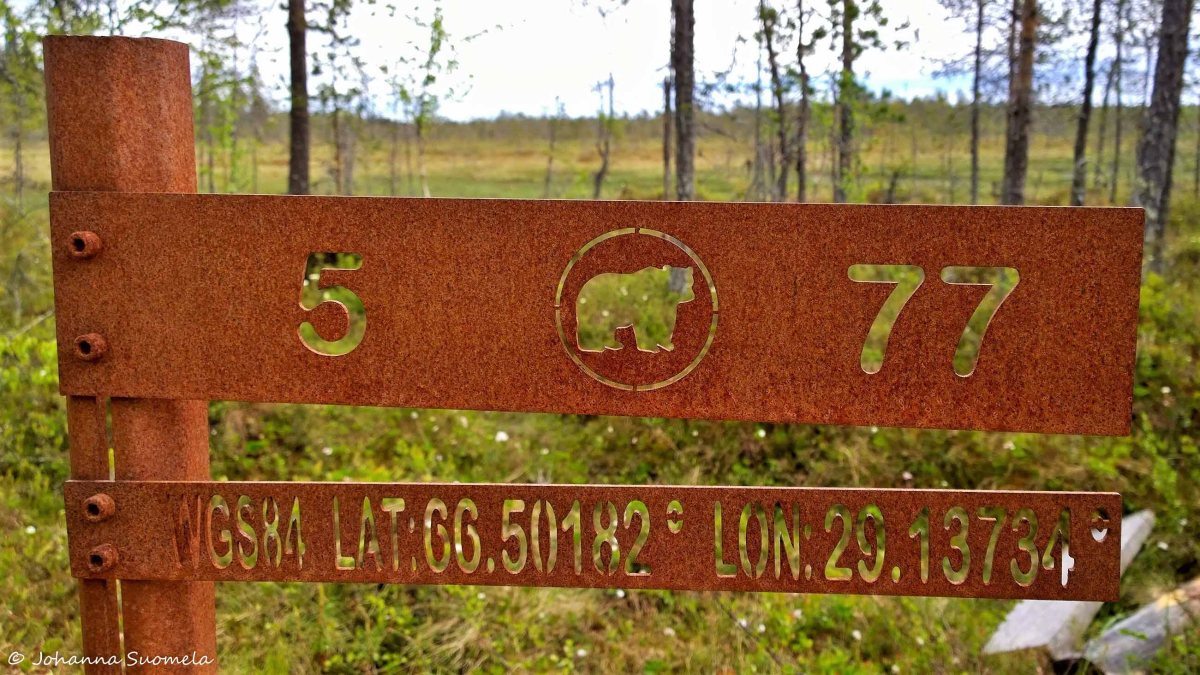 Karhunkierros viiden kilometrin kyltti